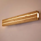 ArborLume Wood Wall Light With Crack Pattern And Warm LED Glow | Snurv