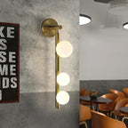 Mienel Lunara | Spherical Warm LED Wall Sconce Black Metal Frame