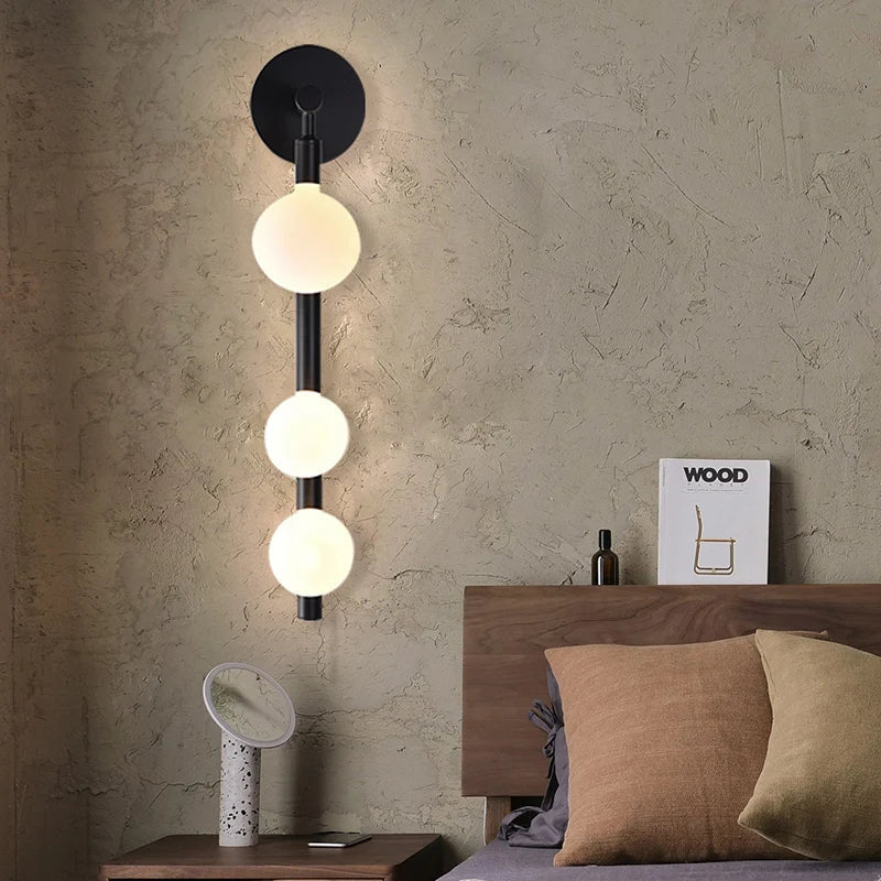 Mienel Lunara | Spherical Warm LED Wall Sconce Black Metal Frame